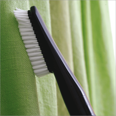 Spazzola per tappezzeria, abiti, tende, animali